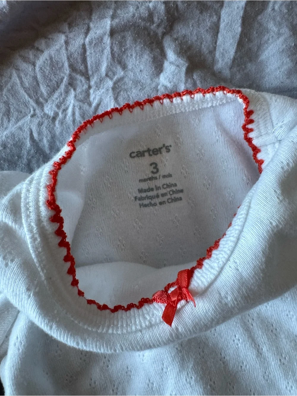 Classic White Baby One-Piece with Orange Trim
